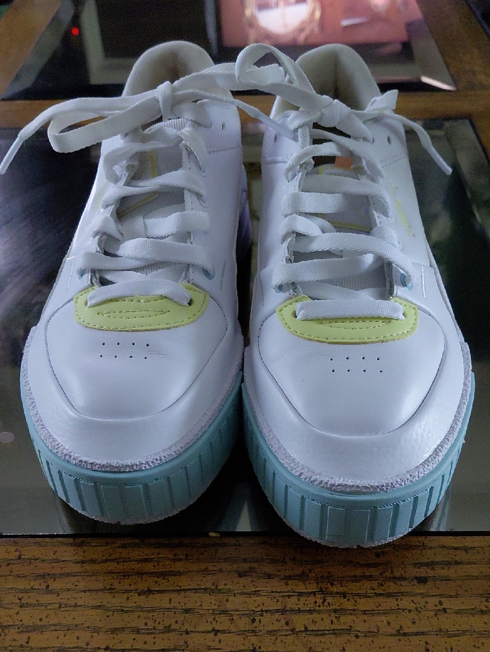 Puma White Sneakers with Light Green Accents and Light Blue Sole